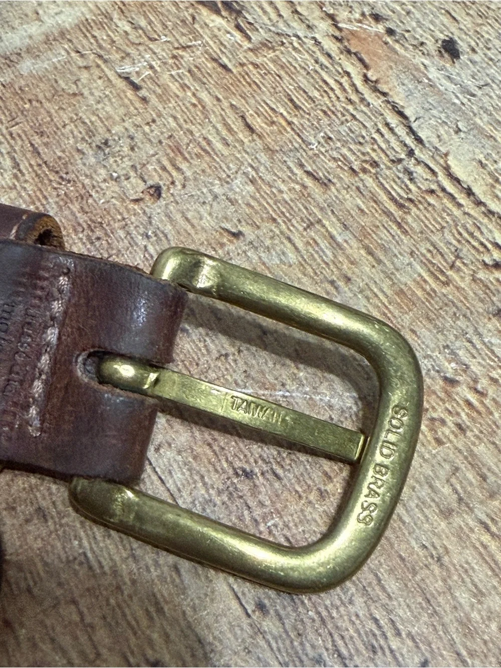 Brown leather braided belt size 31 with brass buckle
